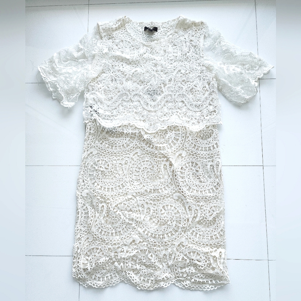 Burberry lace sheath dress with delicate lace overlay.  Made in Italy.  Size 6